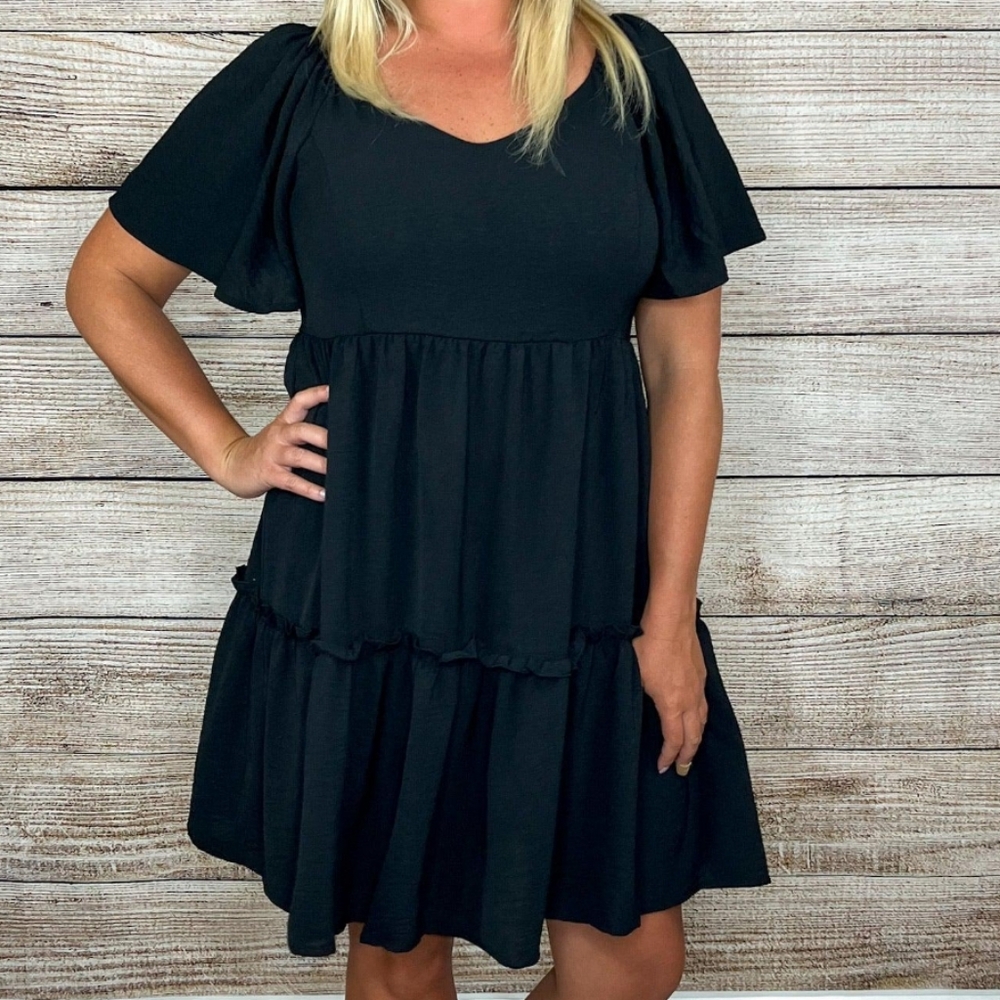 Black winged tiered dress